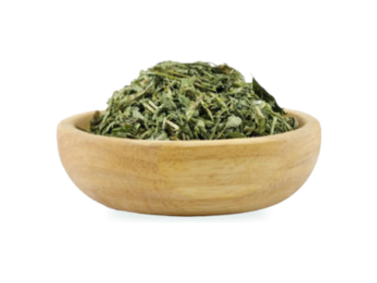 Narmila dried tarragon in a wooden bowl